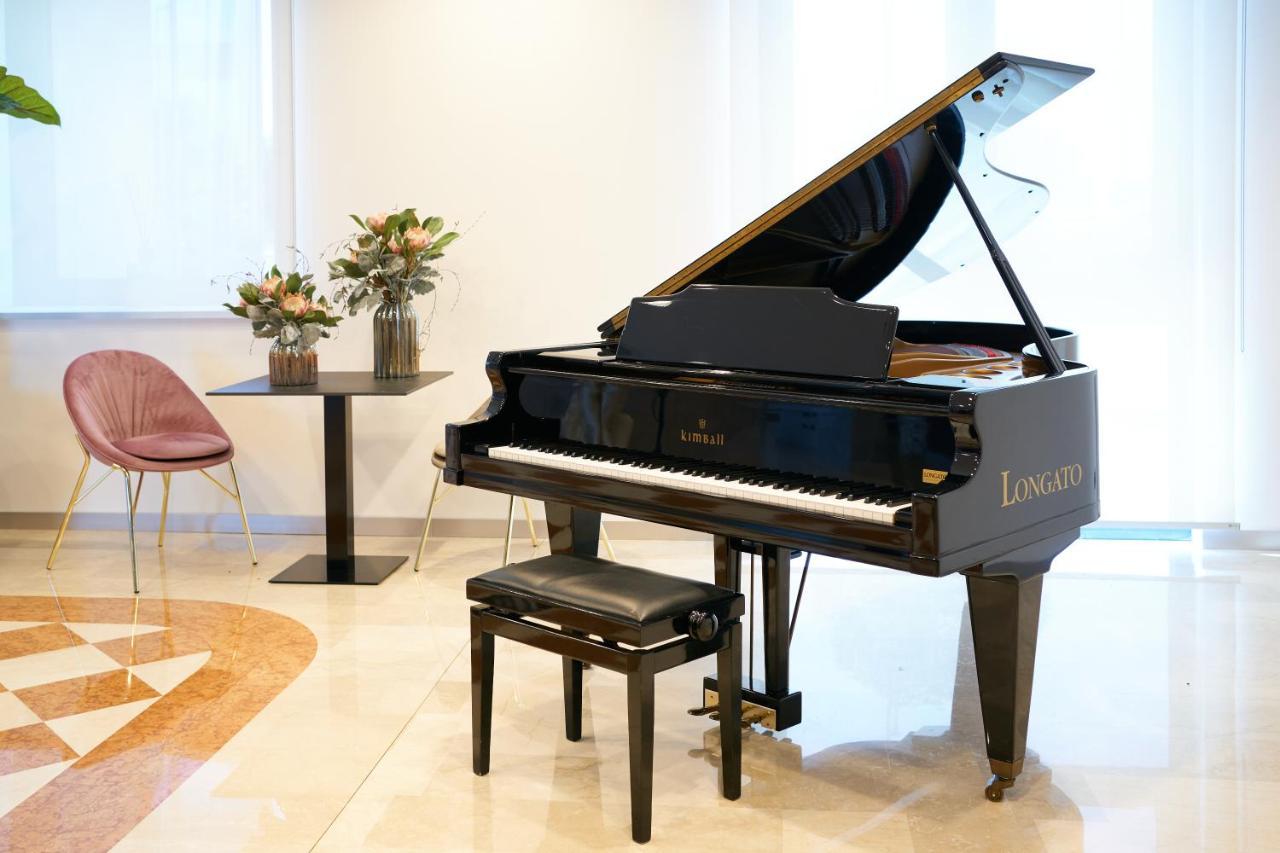 Hotel Omnia โนเวนตา ดิ ปิอาเว ภายนอก รูปภาพ